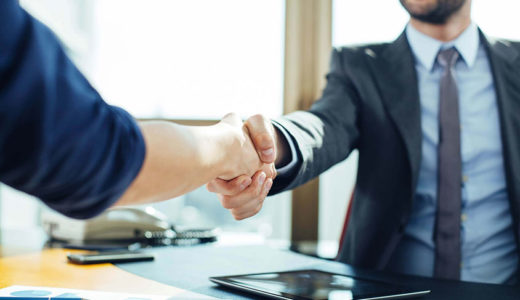 Businessmen-handshaking-after-successful-negotiation Businessmen-handshaking-after-successful-negotiation